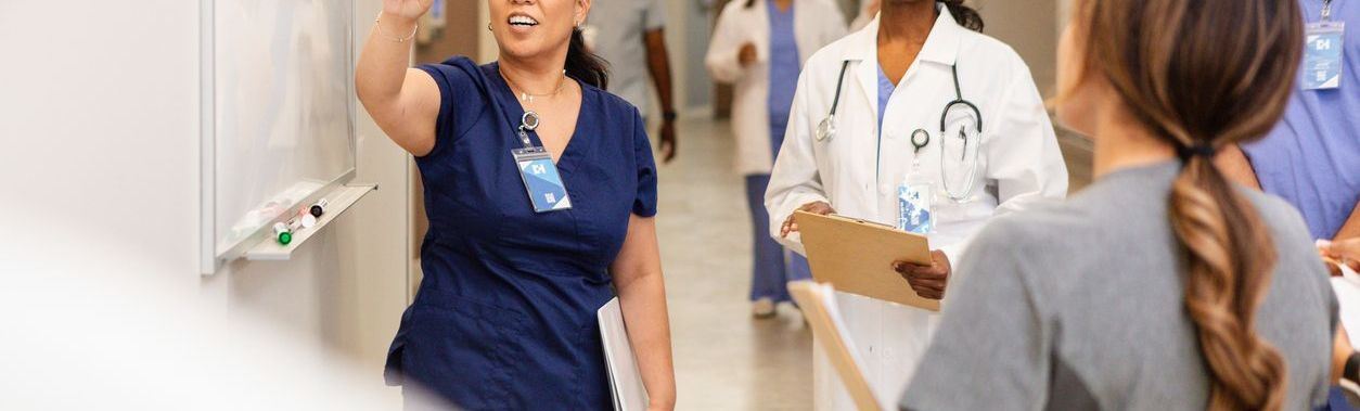 Nurses and doctors meeting to discuss a topic